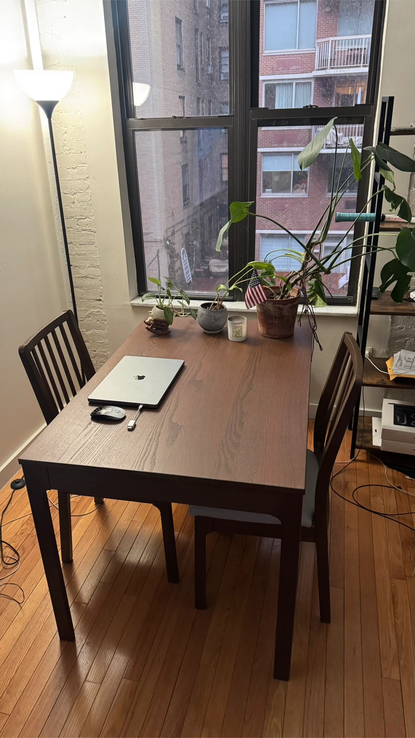 Table dining with 2 chairs.