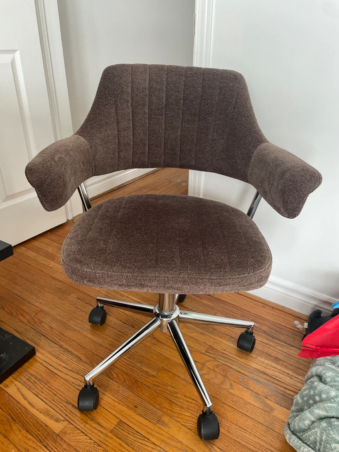 Stylish brown office chair with wheels