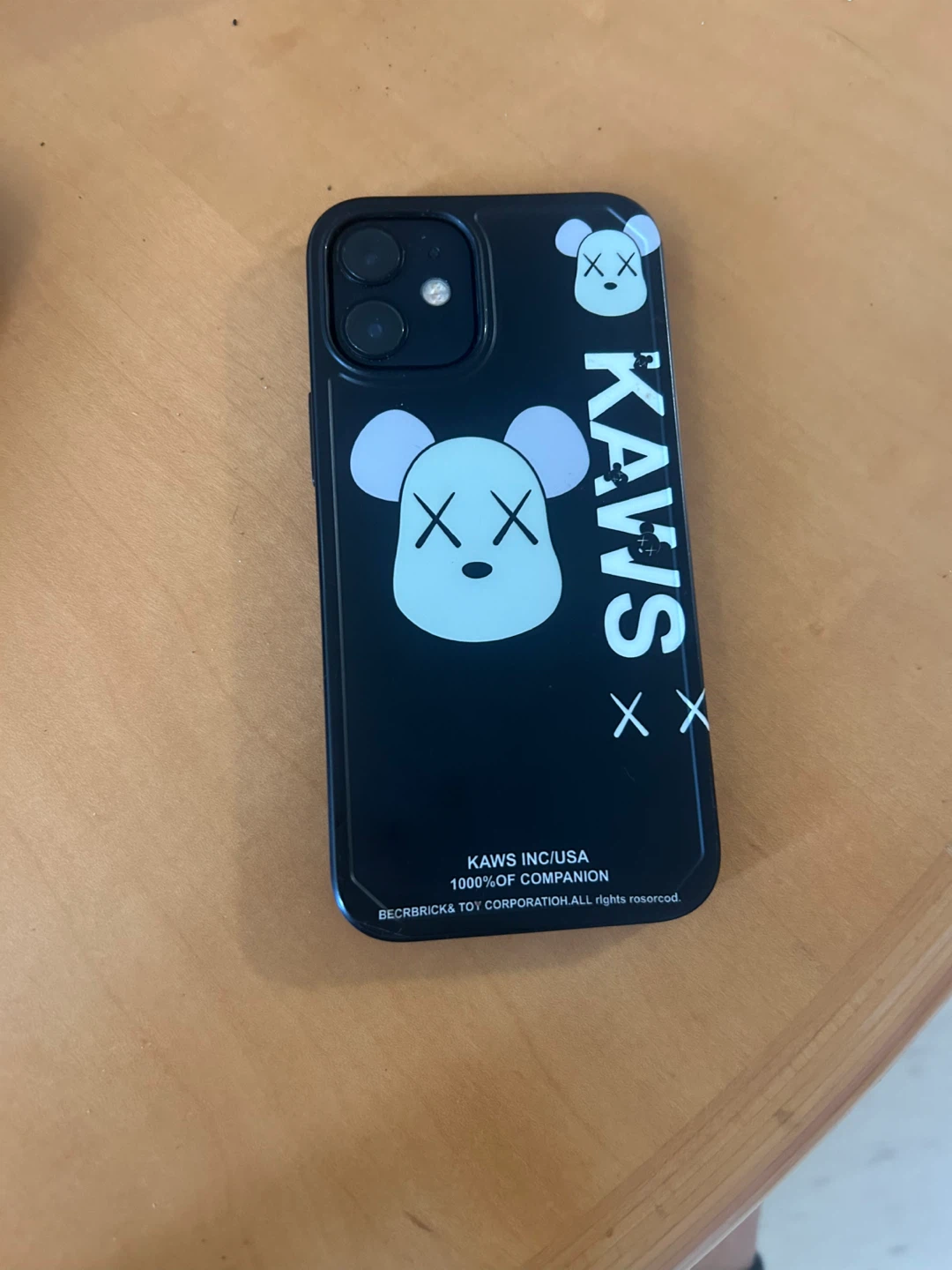 Apple iPhone 12 Mini with KAWS Case