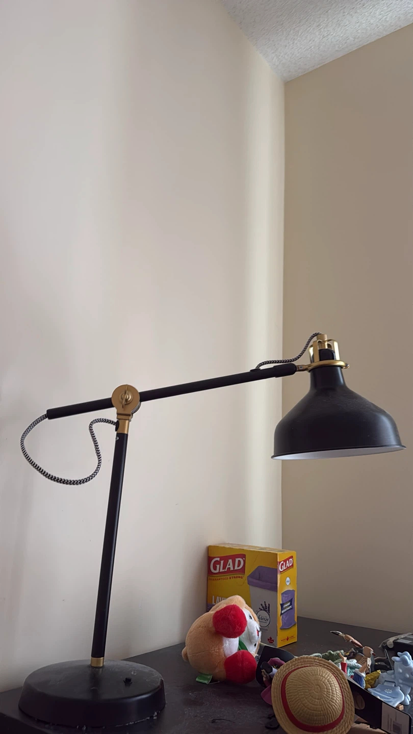 Black task lamp with adjustable arm