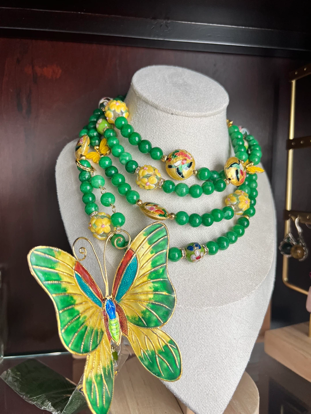 Green Beaded Necklace with Butterfly Pendant