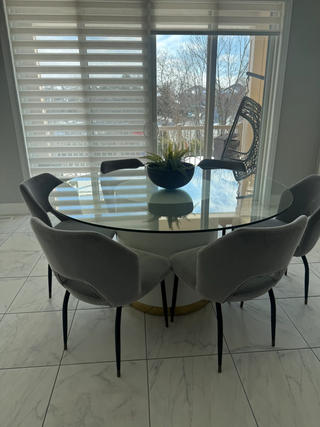 Round Glass Dining Table with 6 Grey Chairs