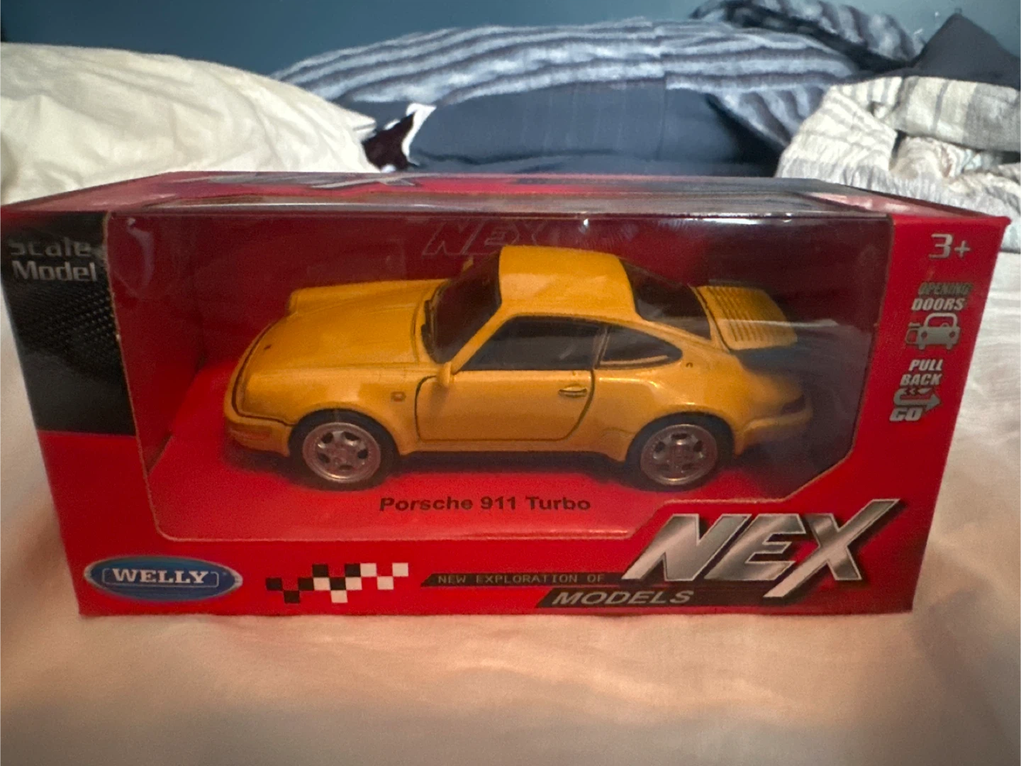 Welly Porsche 911 Turbo Scale Model Car - Yellow