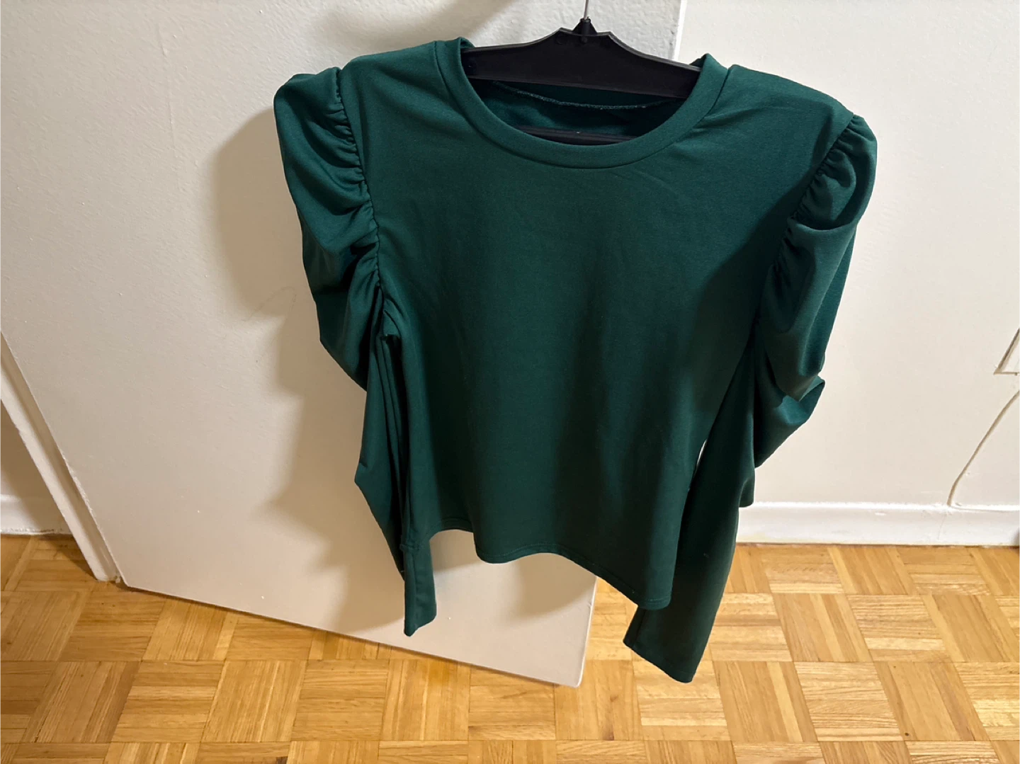 Green long sleeve top with ruched sleeves