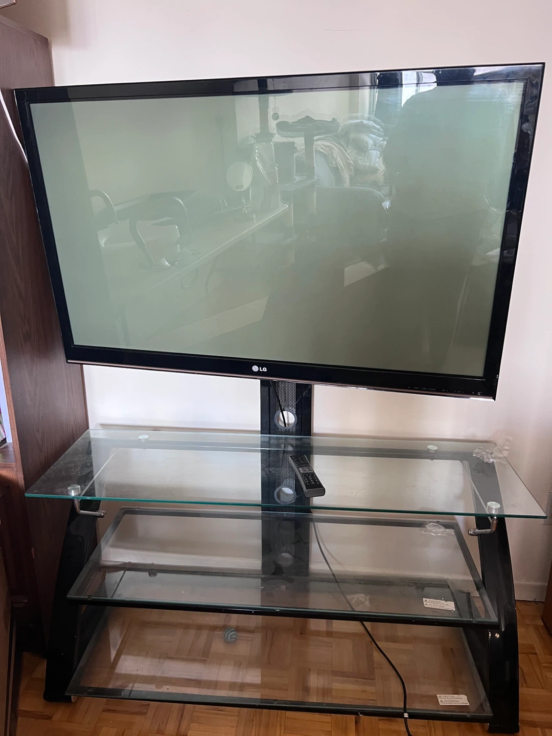 LG TV Stand with Glass Shelves and 55” TV