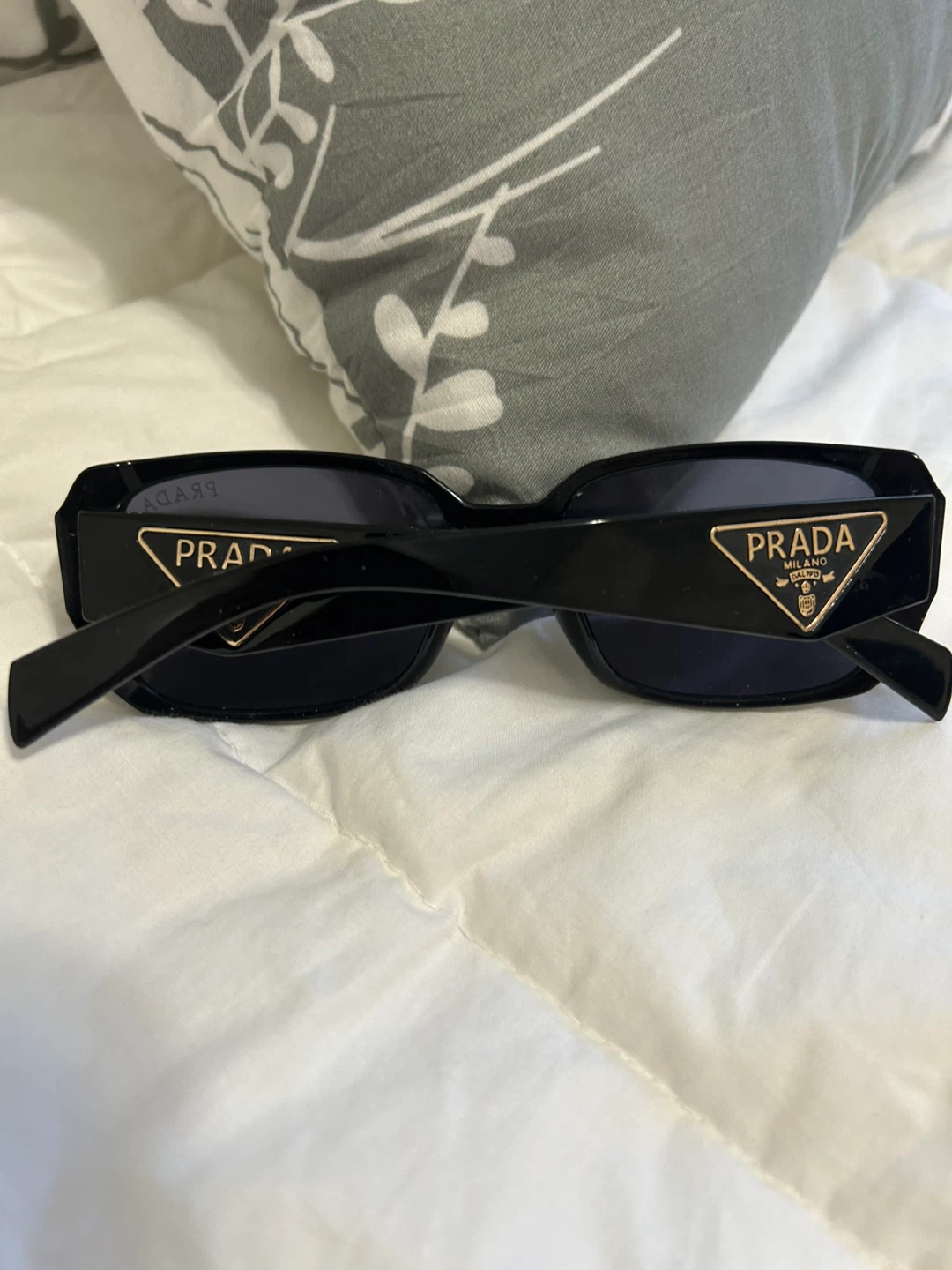 Sunglasses. Black Prada.