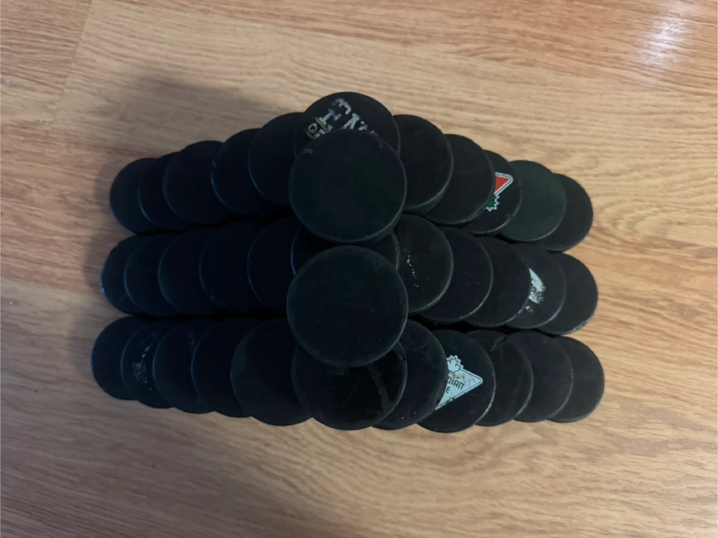65 Used Hockey Pucks - photo 2