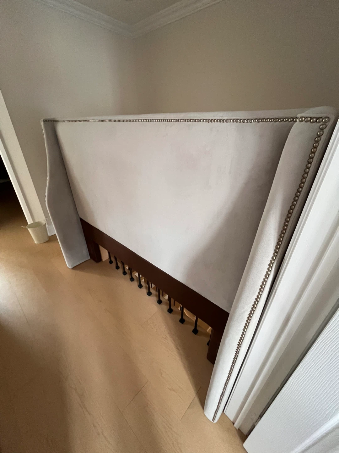 Light Grey Upholstered Headboard with Nailhead Trim