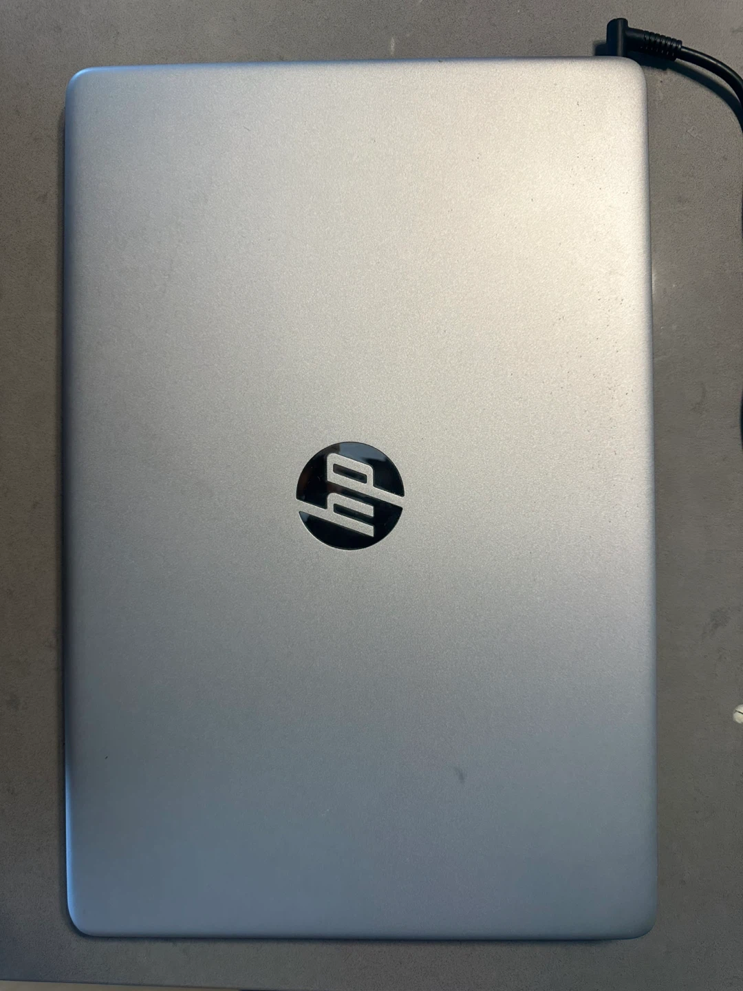HP Silver Laptop with Charger and Clear Case