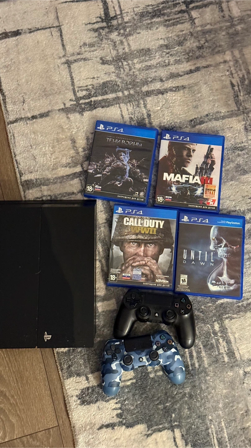 PlayStation 4 Console with 4 Games and 2 Controllers - photo 2
