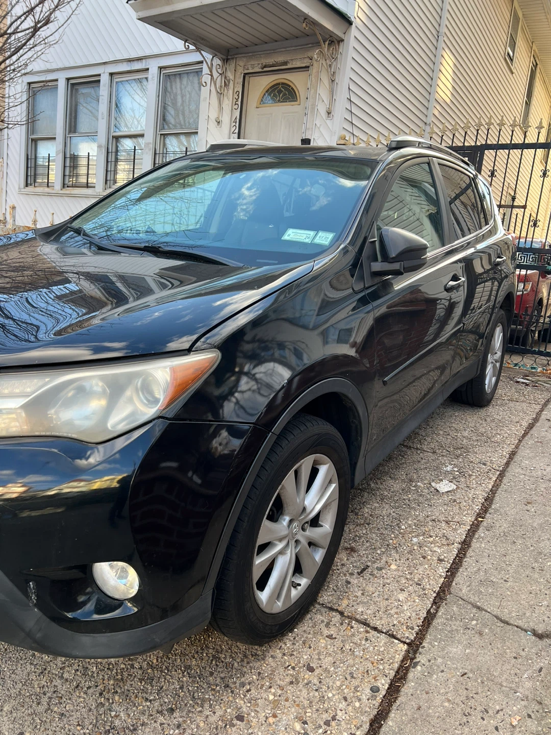 Black Toyota RAV4 SUV - photo 3