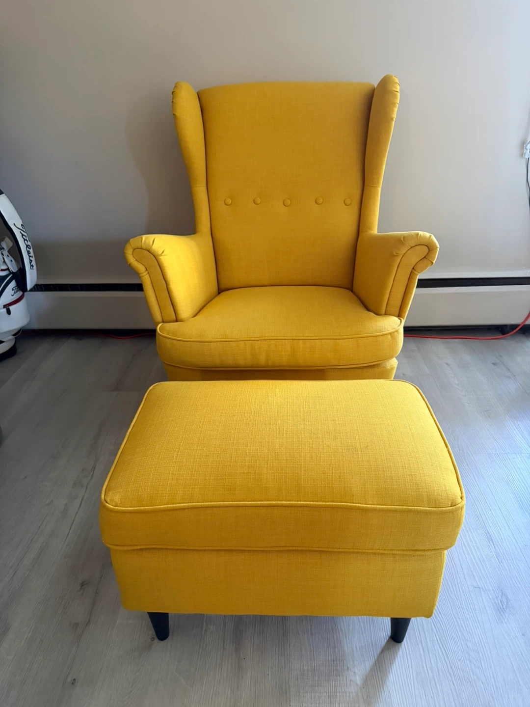 IKEA STRANDMON armchair and footstool
