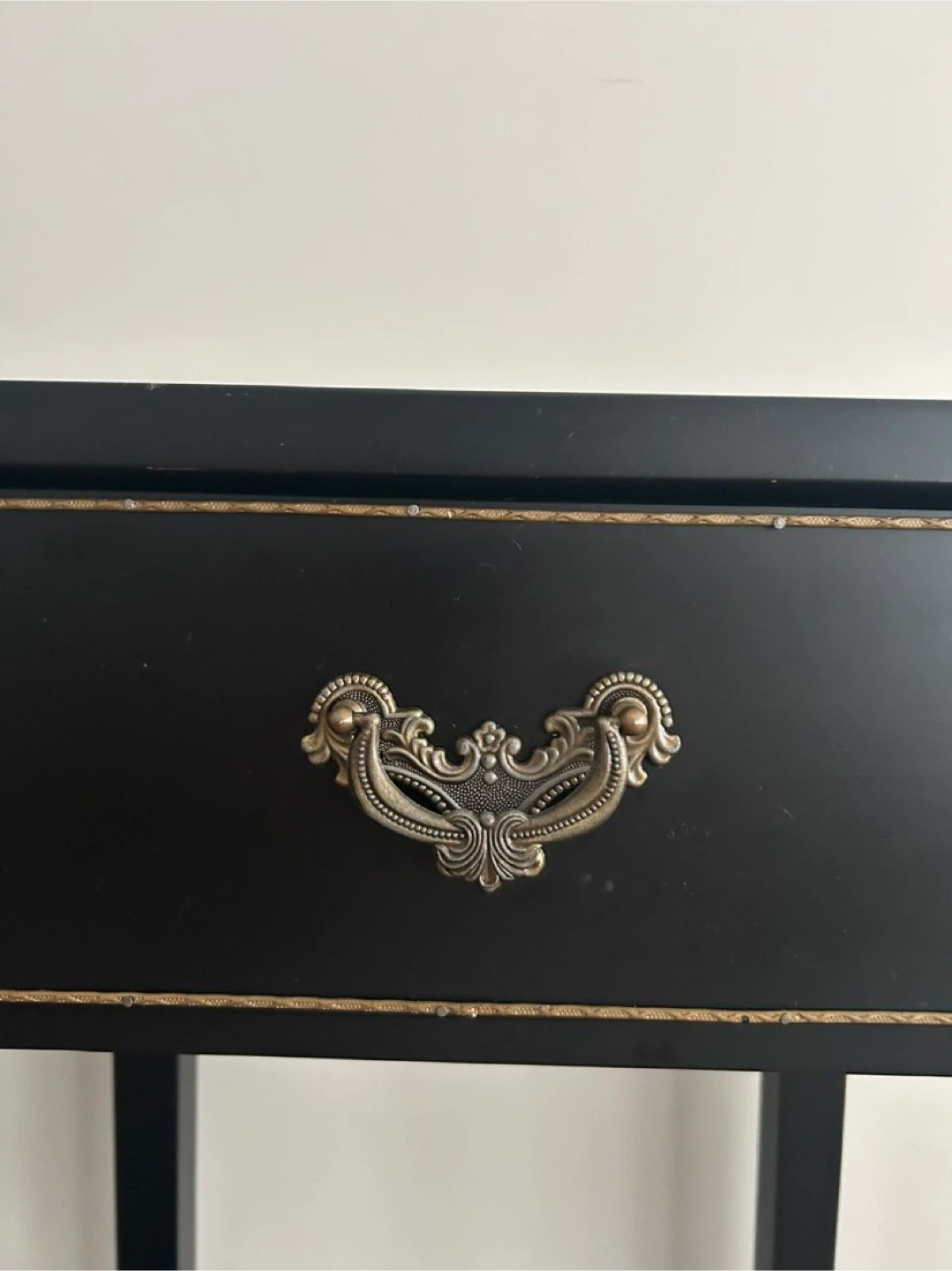 Black Console Table with Ornate Drawer Pulls