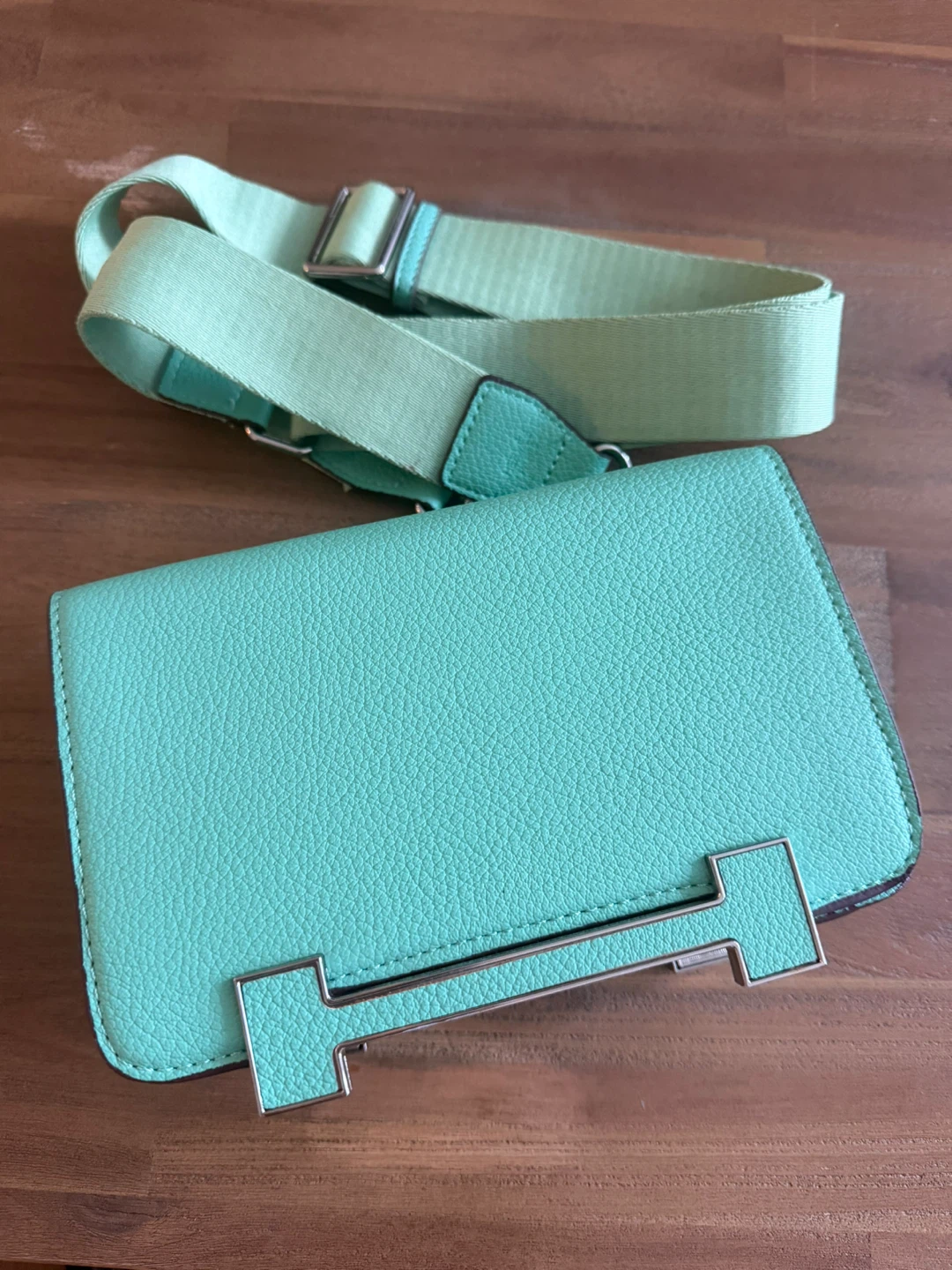 Turquoise crossbody purse with adjustable strap