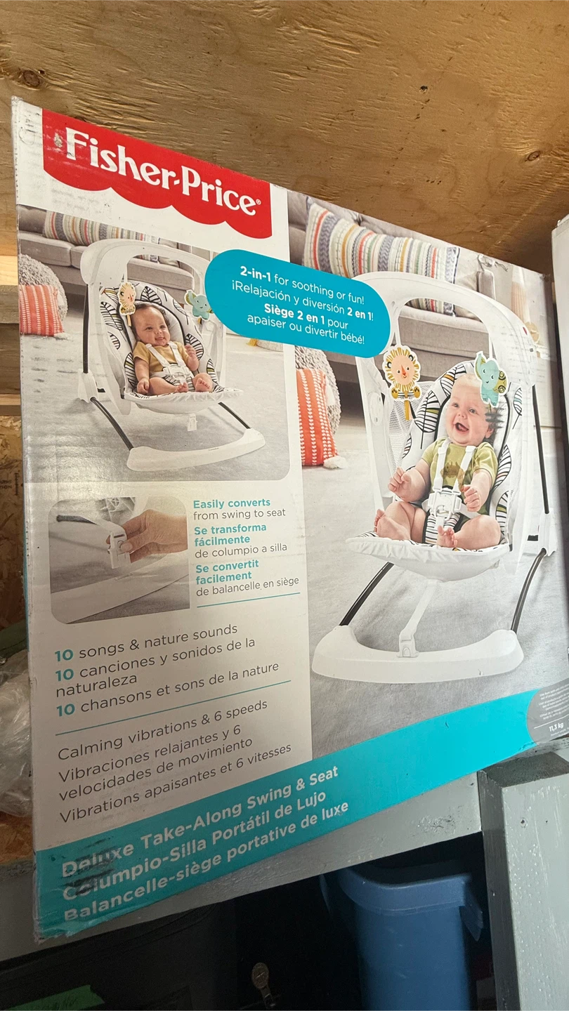 Never used still in a box Fisher-Price Deluxe Swing & Seat