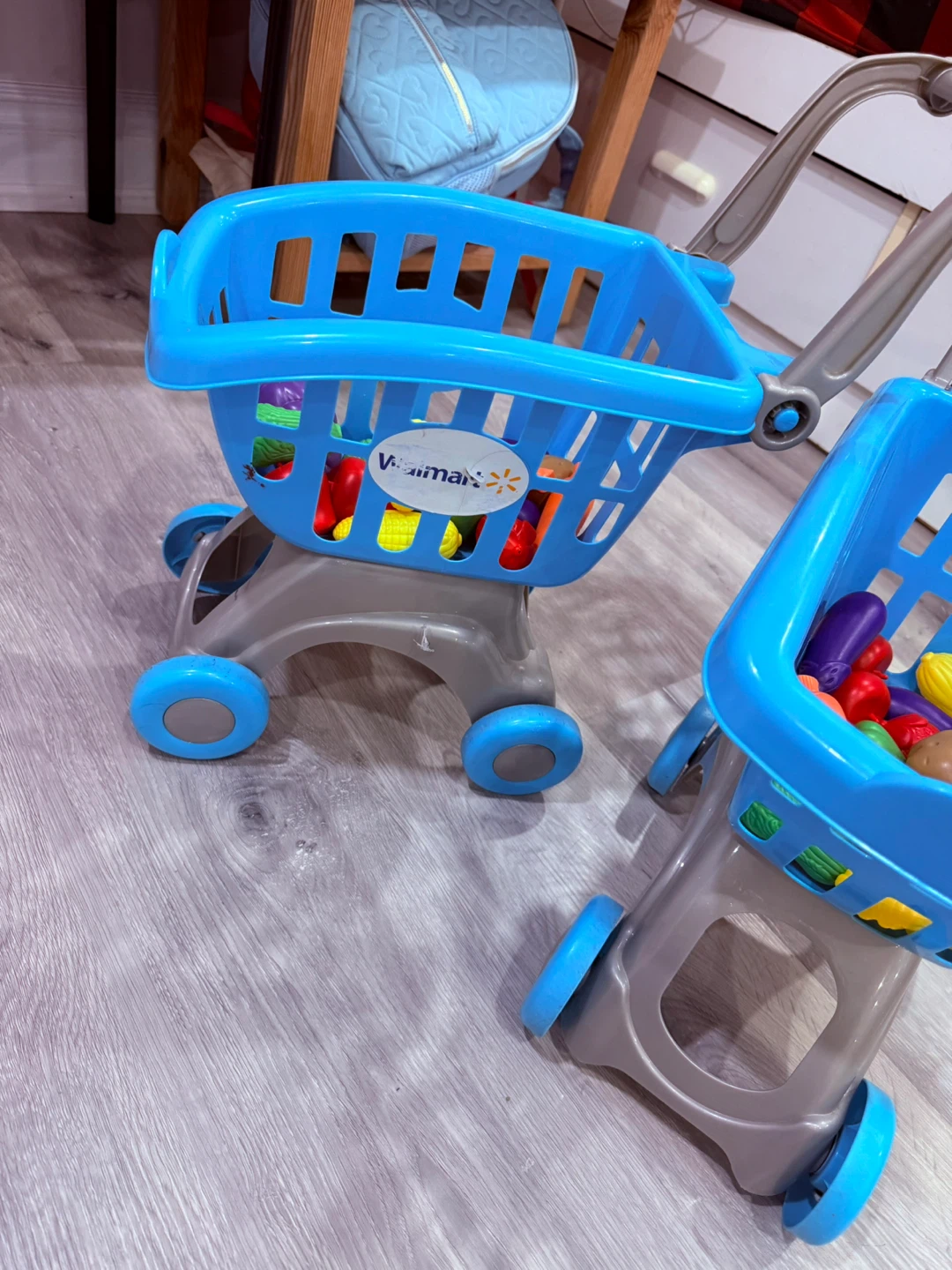 Two Blue Toy Shopping Carts with Play Food - photo 3