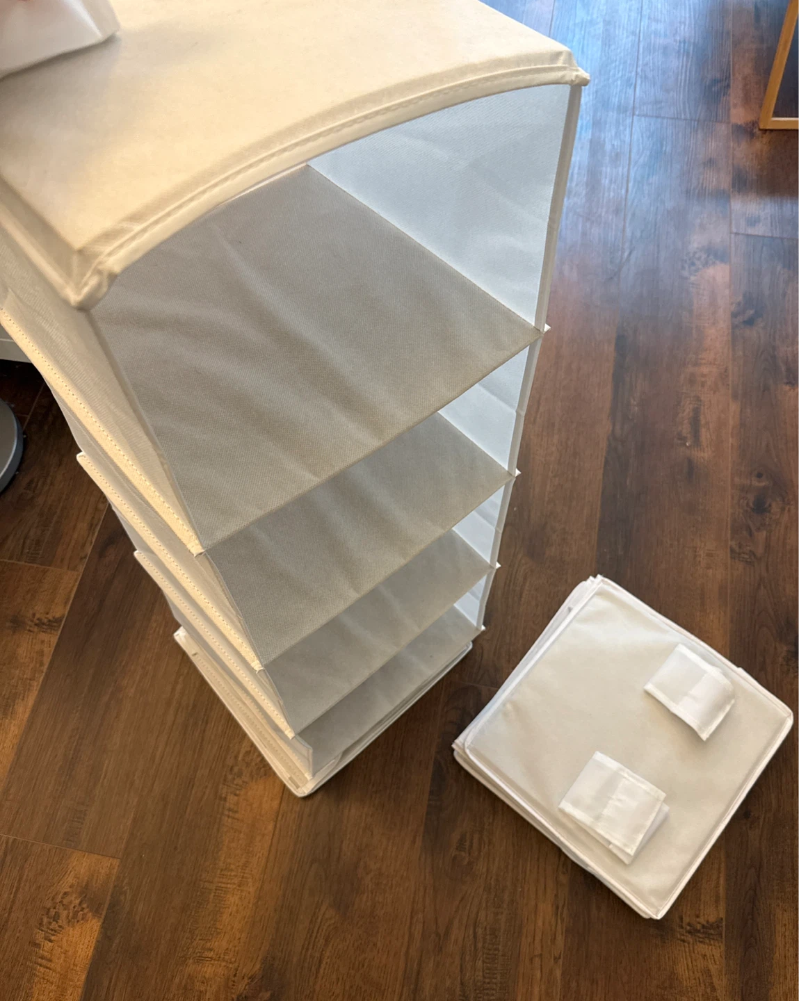 2 White hanging closet organizers