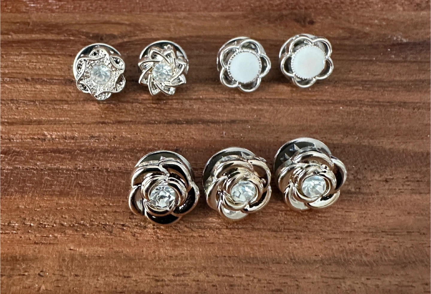 7 Flower Shaped Brooch Pins - $3 - East York