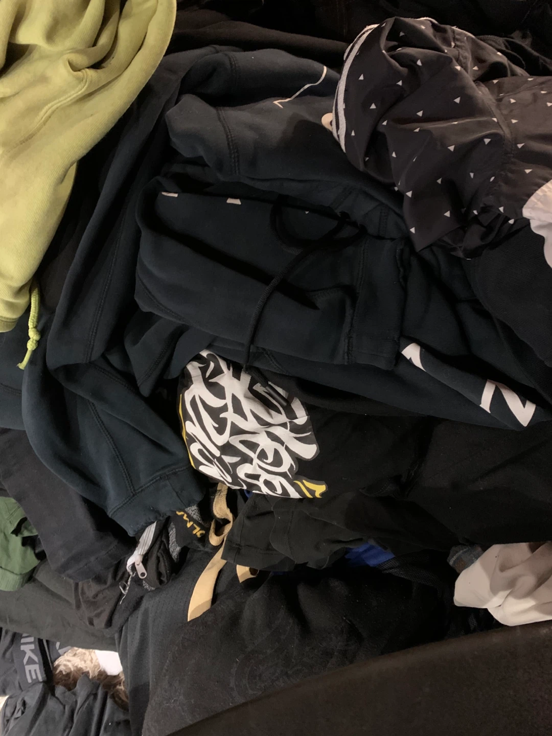 Bundle of assorted men's clothing