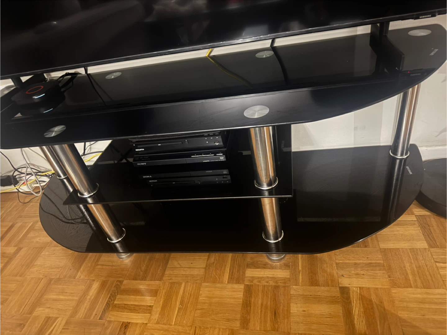 Black Glass TV Stand with Silver Legs