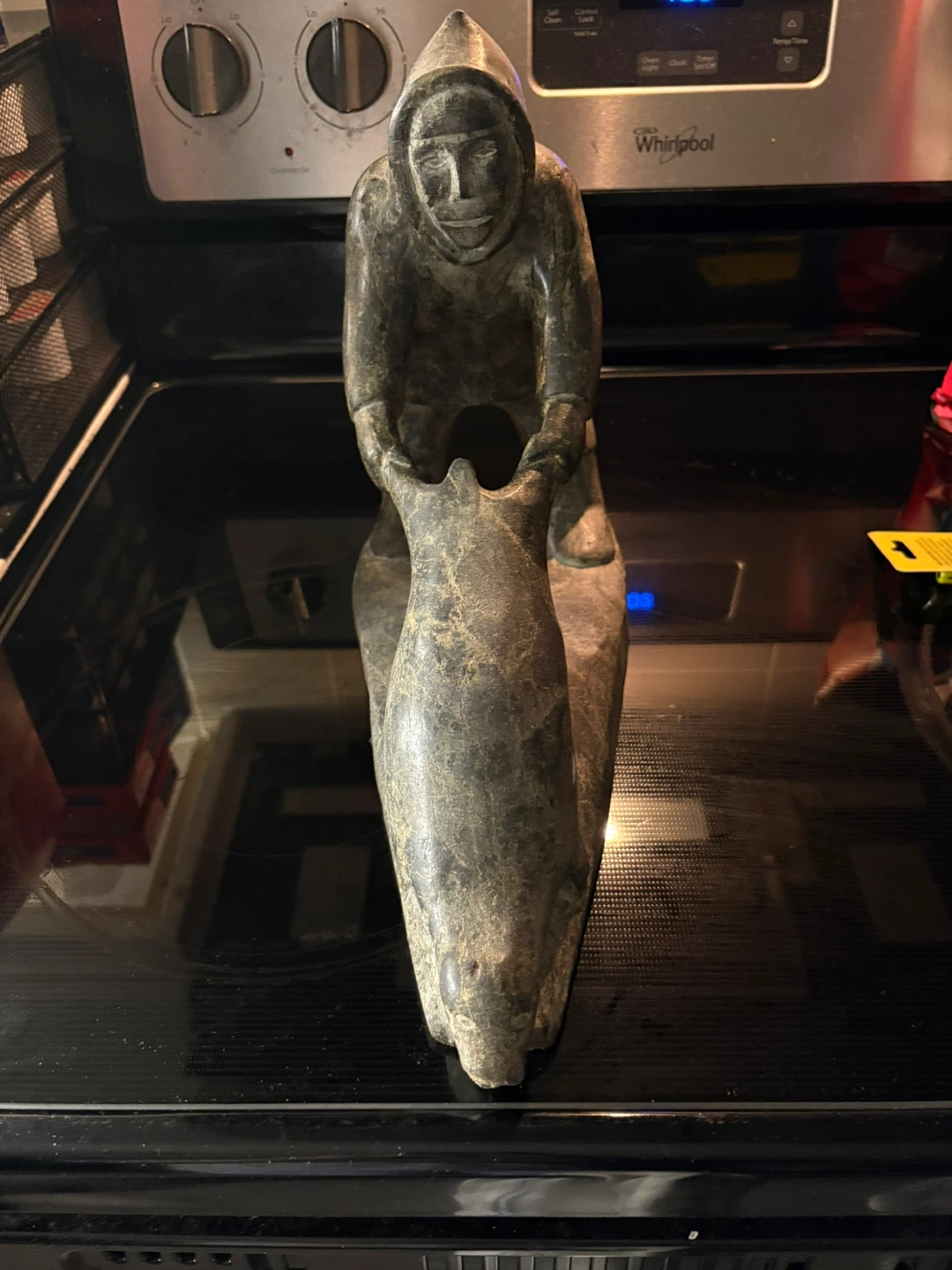 Carved Stone Figurine of Person with Animal
