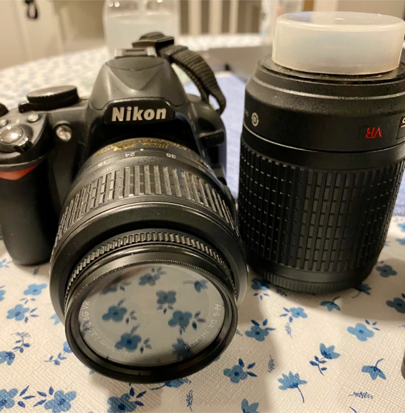 Nikon D3100 DSLR, 2 Lenses, Waterproof padded Lowepro Bag, Books
