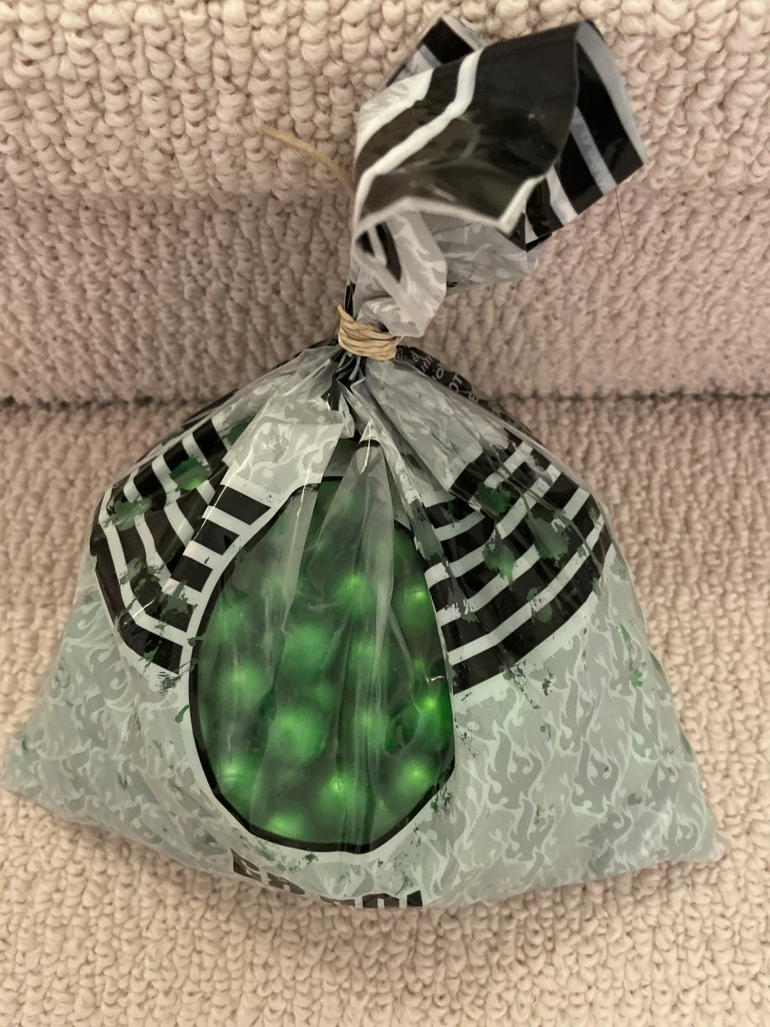 Bag of green paintballs