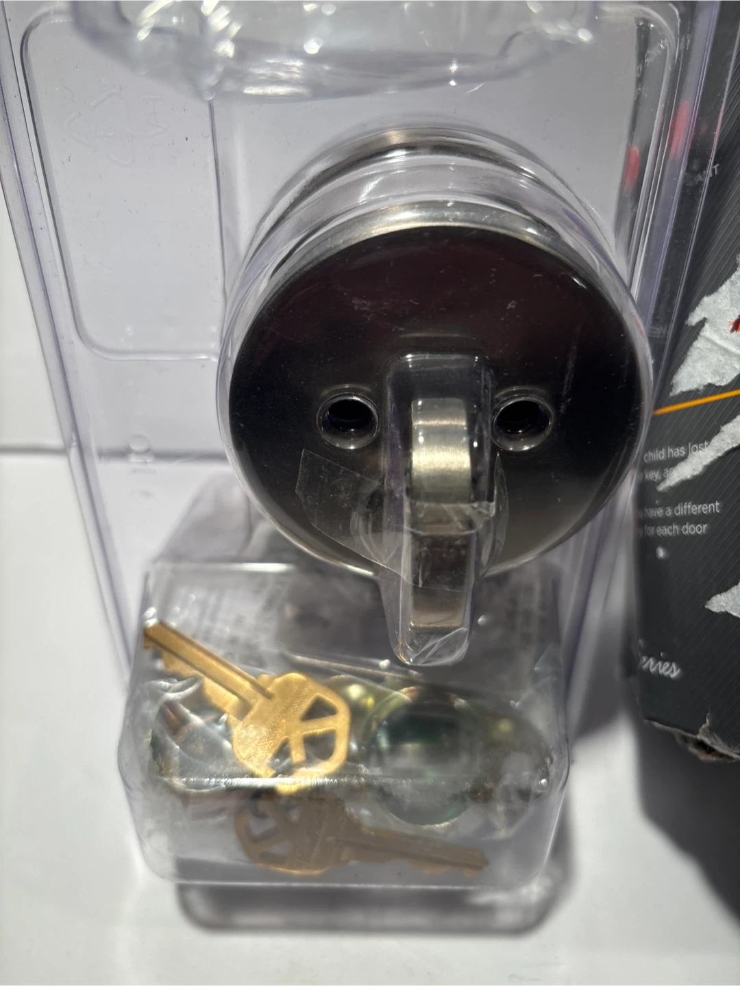 Kwikset Satin Nickel Entry Door Lock with 2 Keys - photo 2