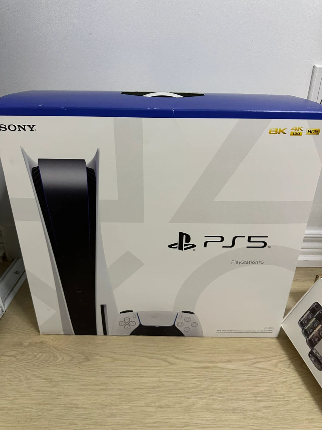 Sony PlayStation 5 Disc Console with two controllers