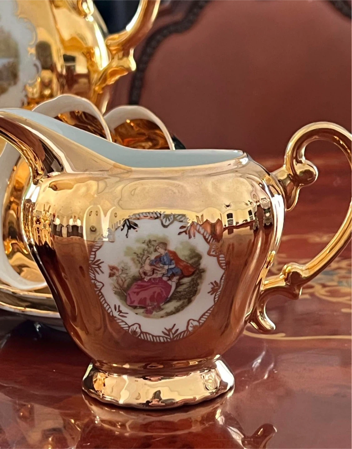 Gold Tone Creamer Pitcher with Romantic Scene