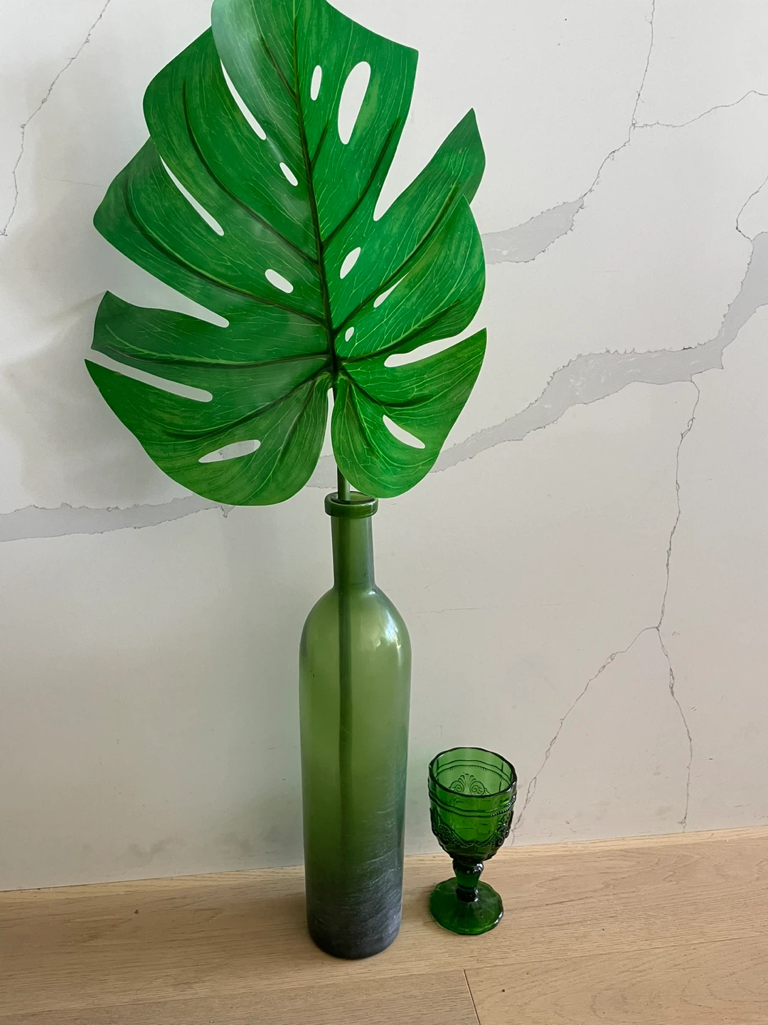 Green Glass Bottle and Goblet