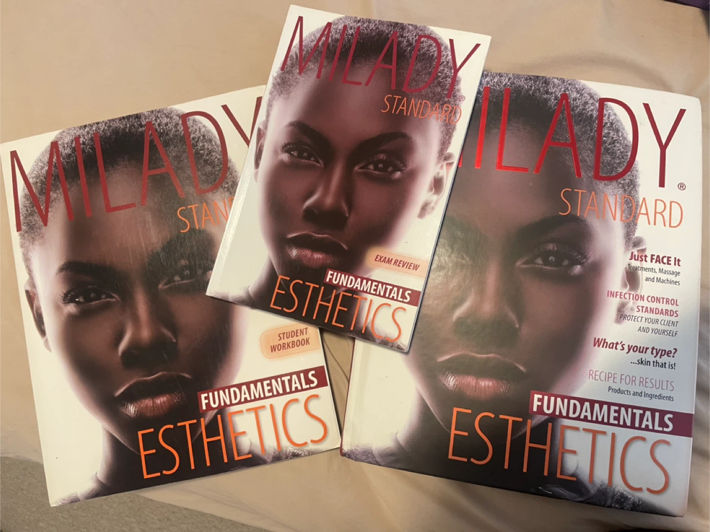 Milady Standard Fundamentals Esthetics Textbooks and Workbook