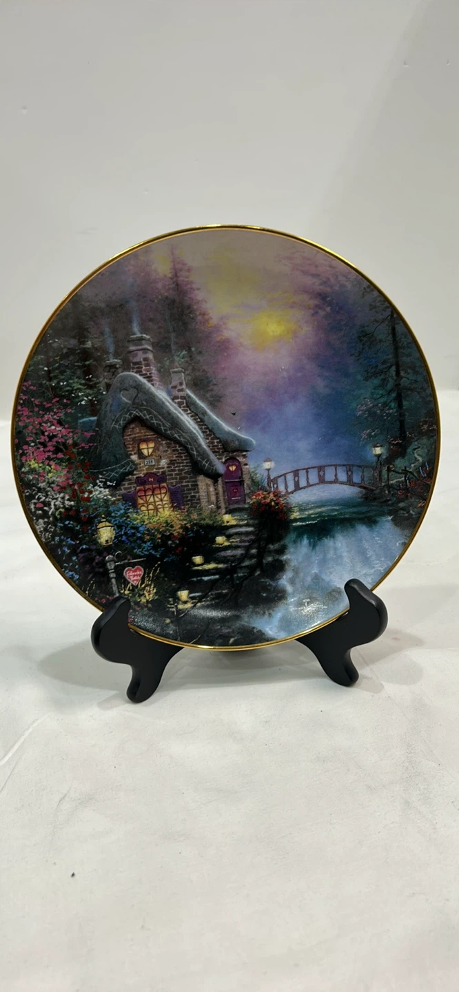 Thomas  Kinkade enchanted cottage collection