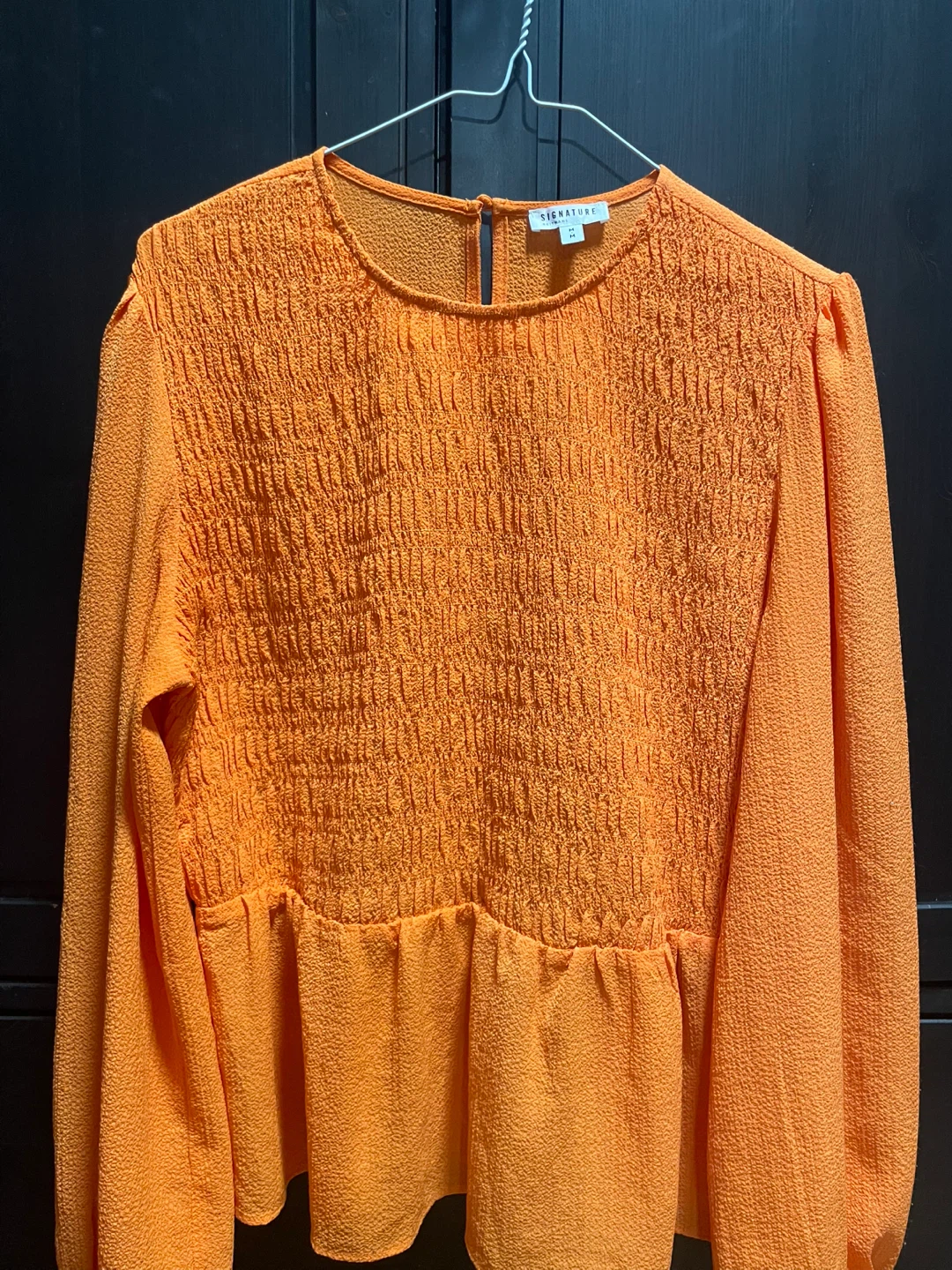 Orange Smocked Peplum Top