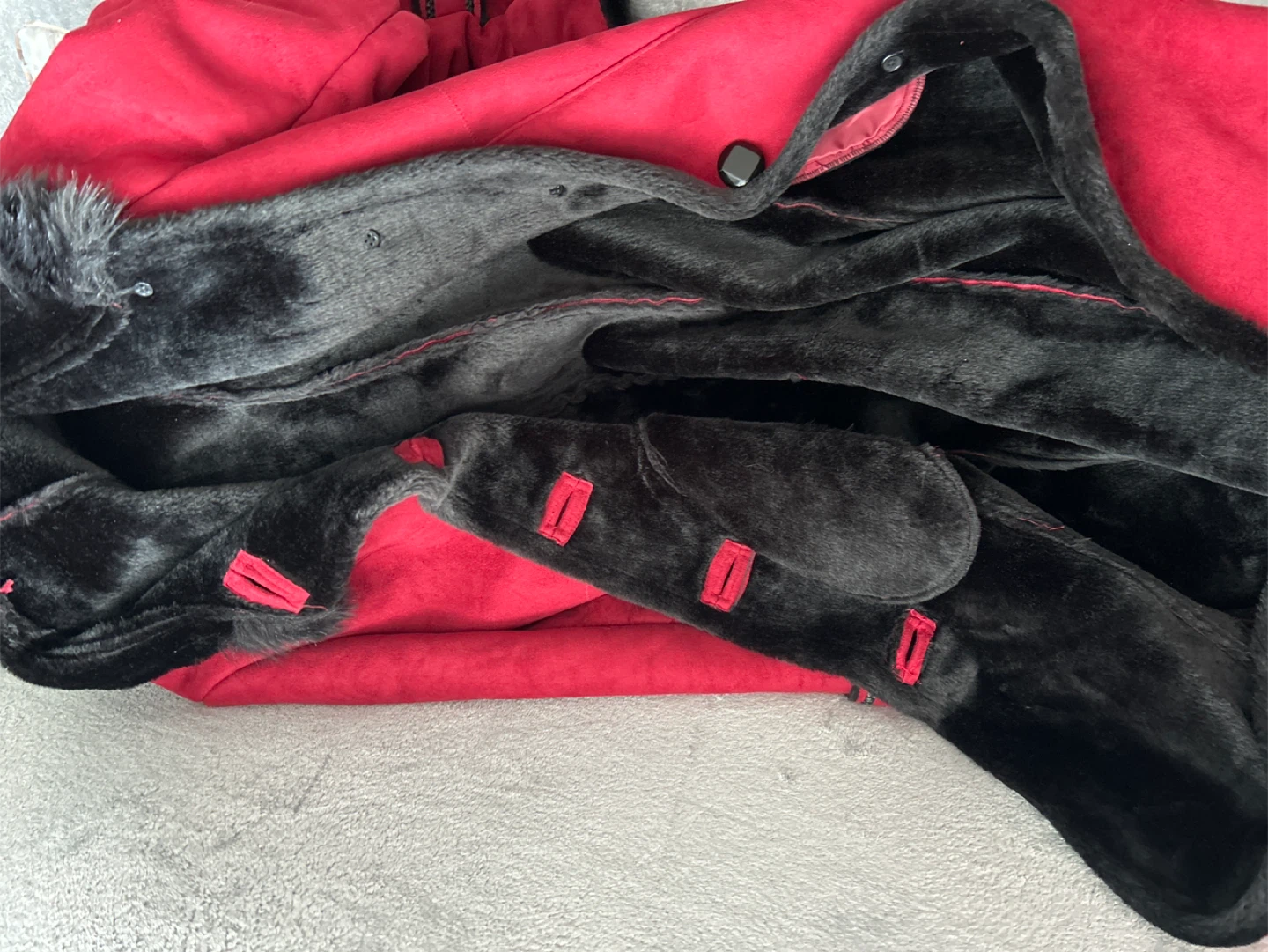 Red faux suede coat with black faux fur trim