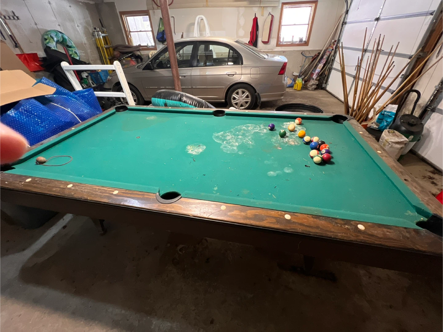Pool Table with balls and poolsticks