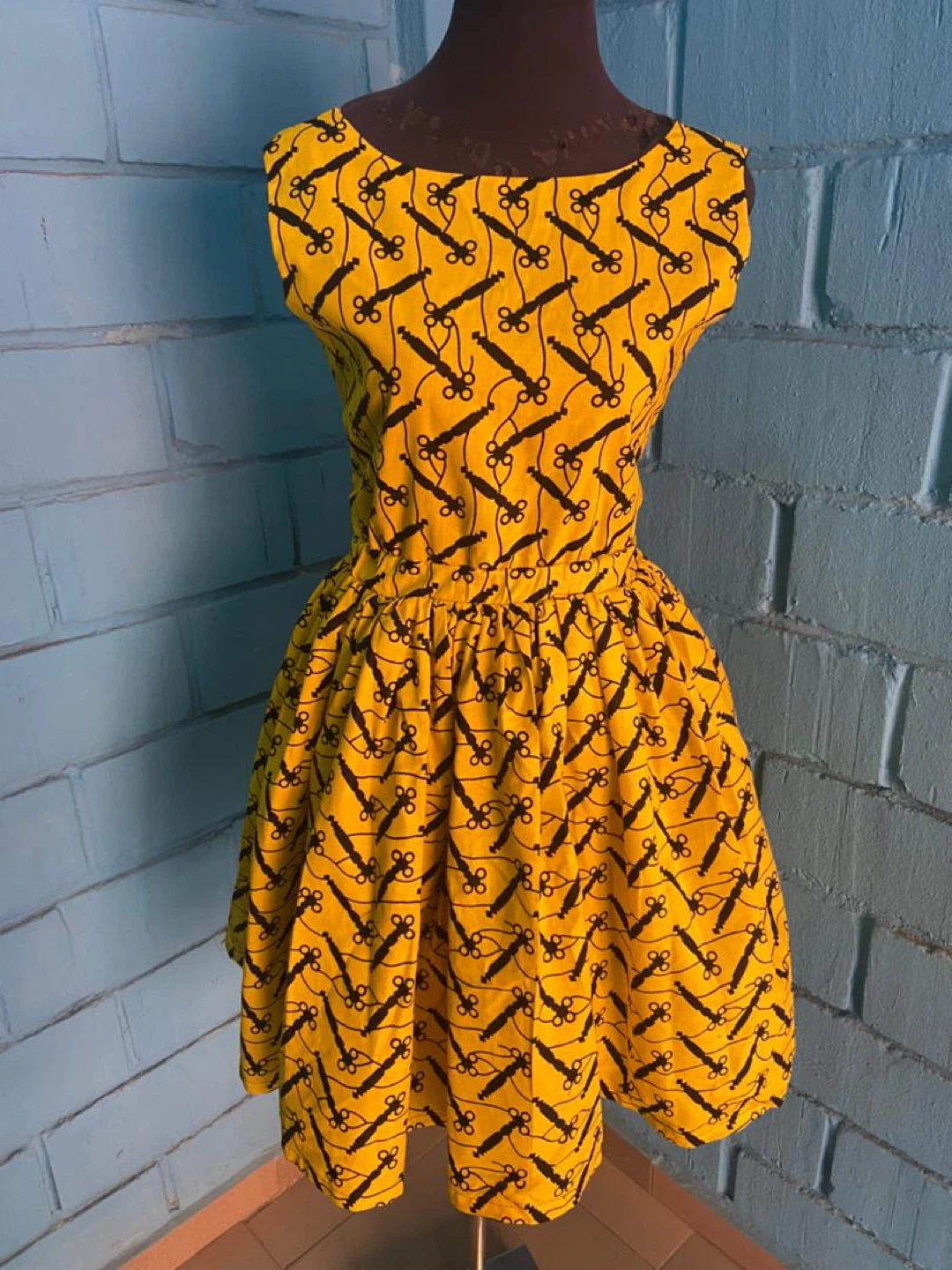 Yellow Sleeveless Dress with Black Pattern - photo 2