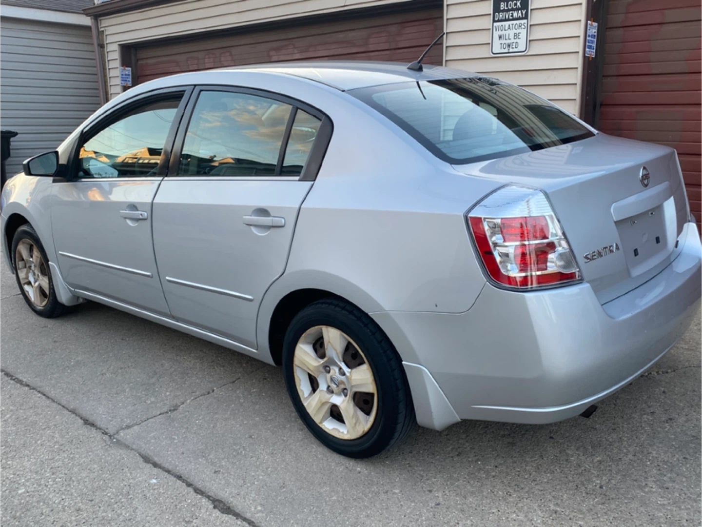 Silver Nissan Sentra - photo 5