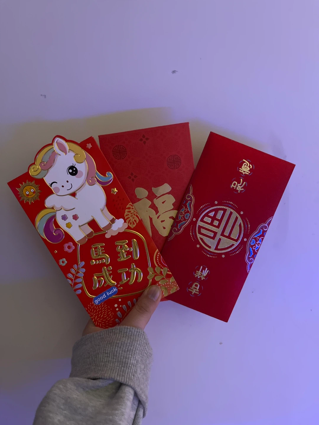 Red Envelopes with Unicorn and Chinese Characters