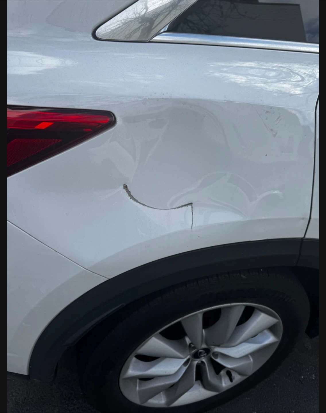 Damaged Rear Quarter Panel - Grey SUV