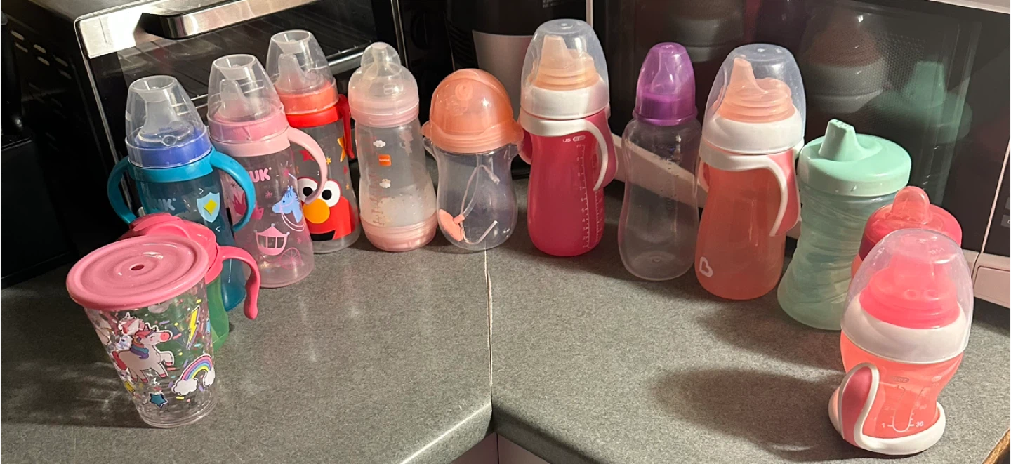 Assorted Baby Bottles and Sippy Cups