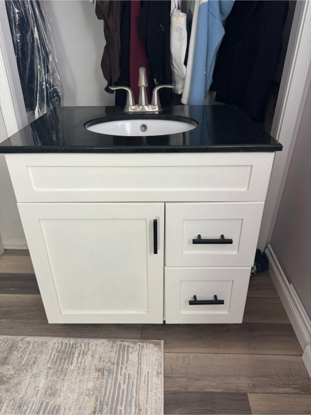 White Vanity with Black Granite Top and Sink