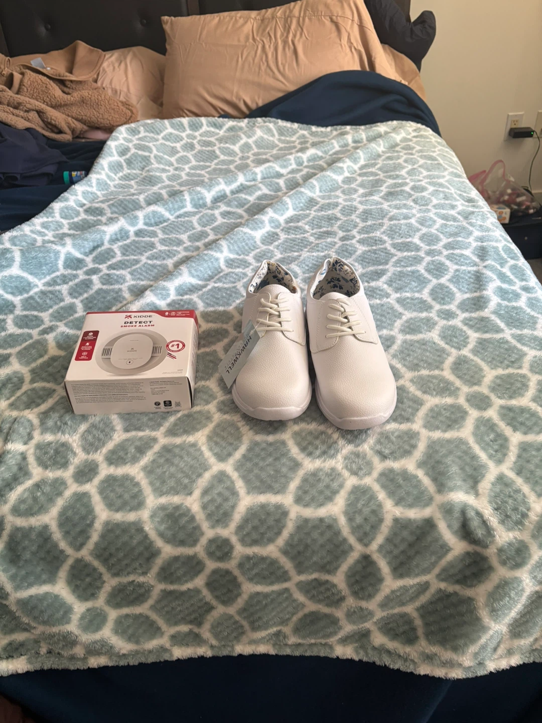 Hello   ,  I’m a pair of nurse  shoes white .