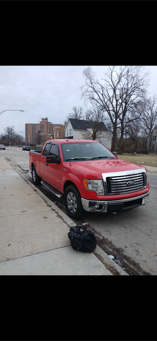 Red Ford F-150 Pickup Truck