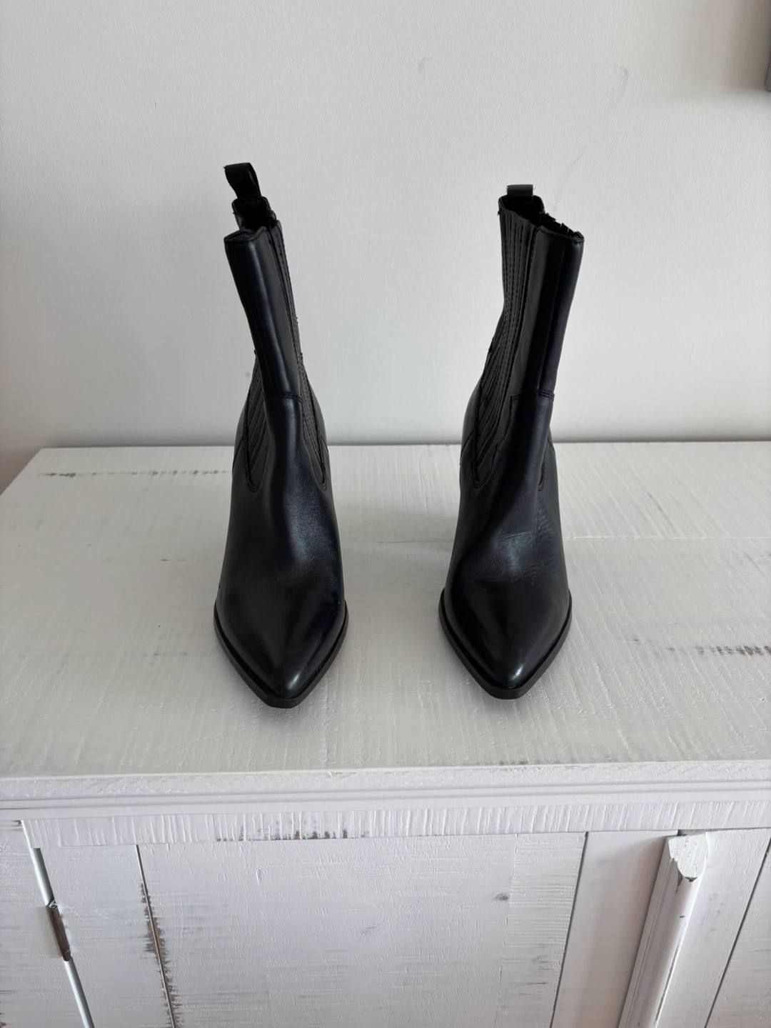 Also black cowboy boots. Size 7