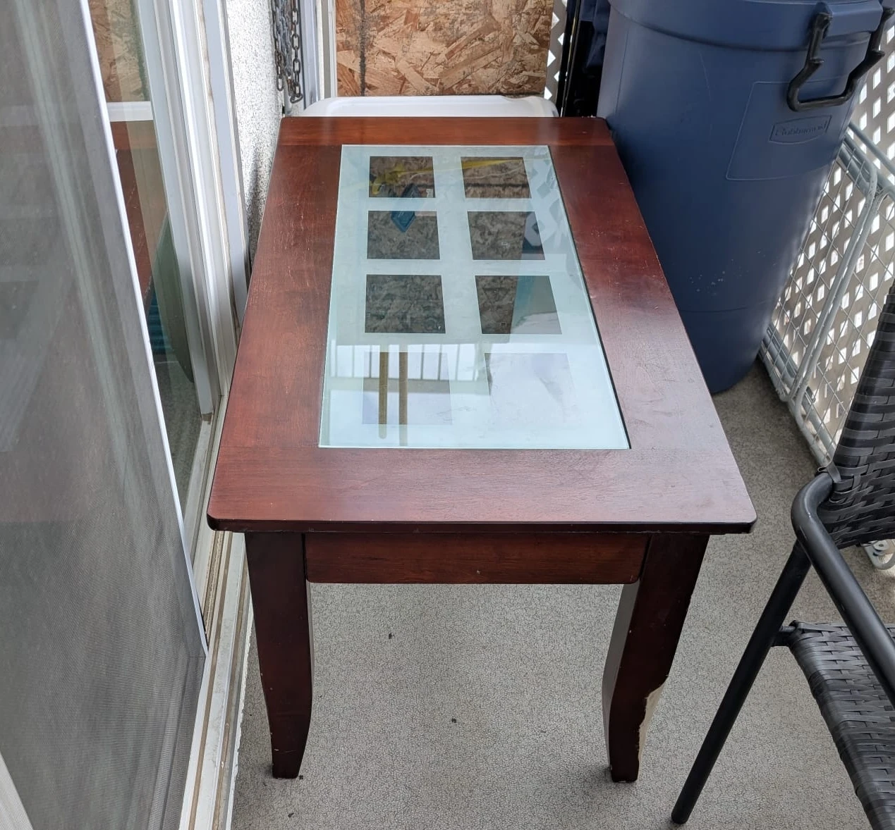 Wooden coffee table with glass insert