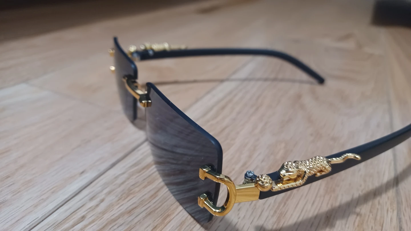 Rimless Sunglasses with Gold Panther Accents