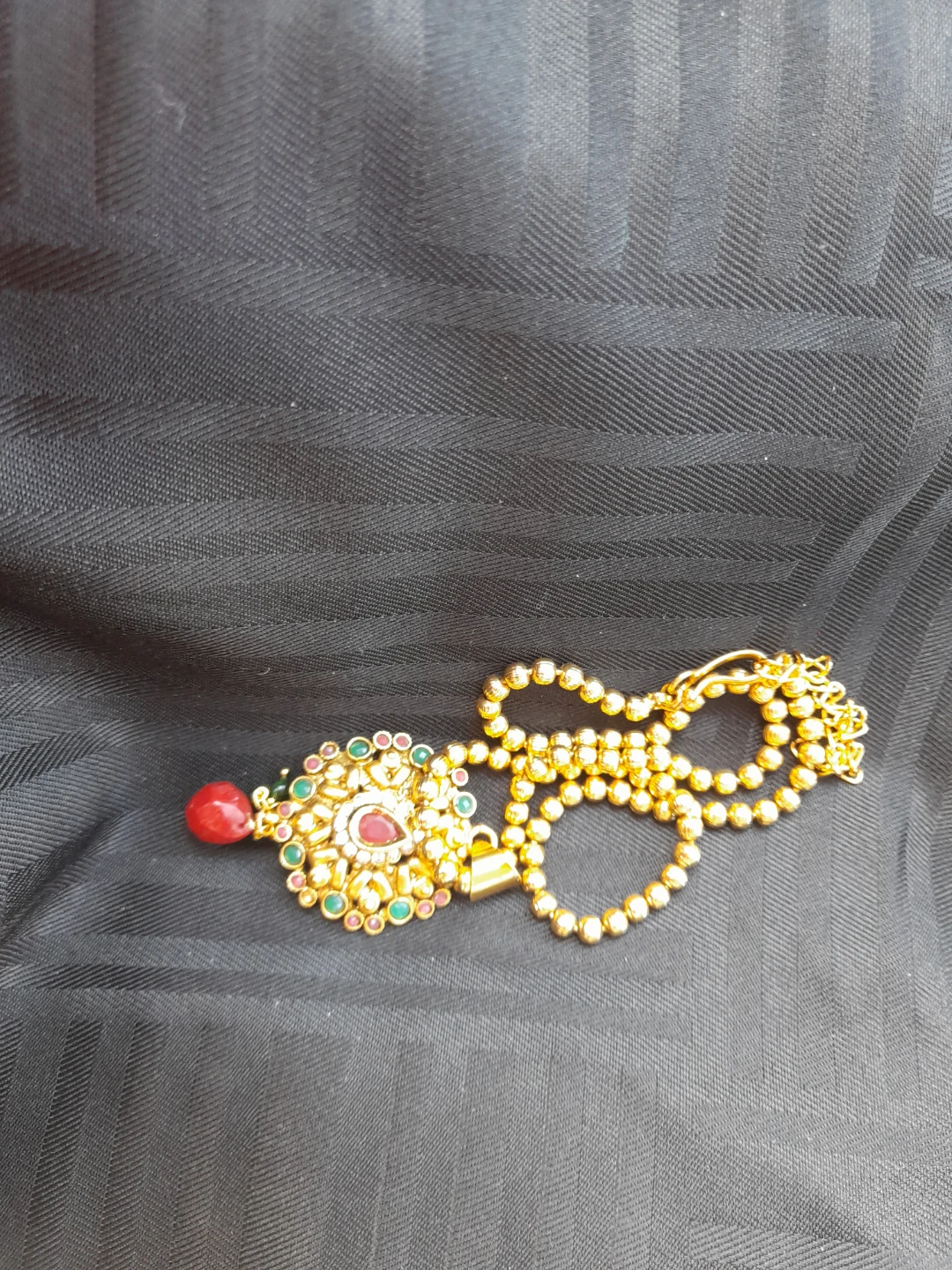 Faux Gold-tone pendant with red and green stones - photo 2