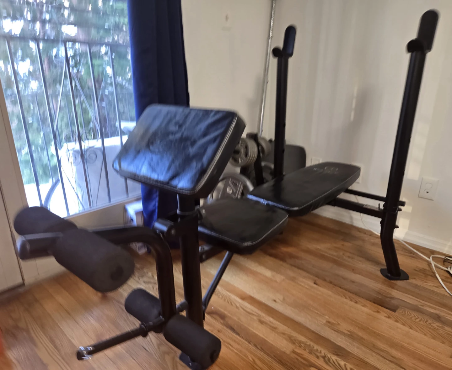 Marcy Weight Bench with Barbell and Weight Plates
