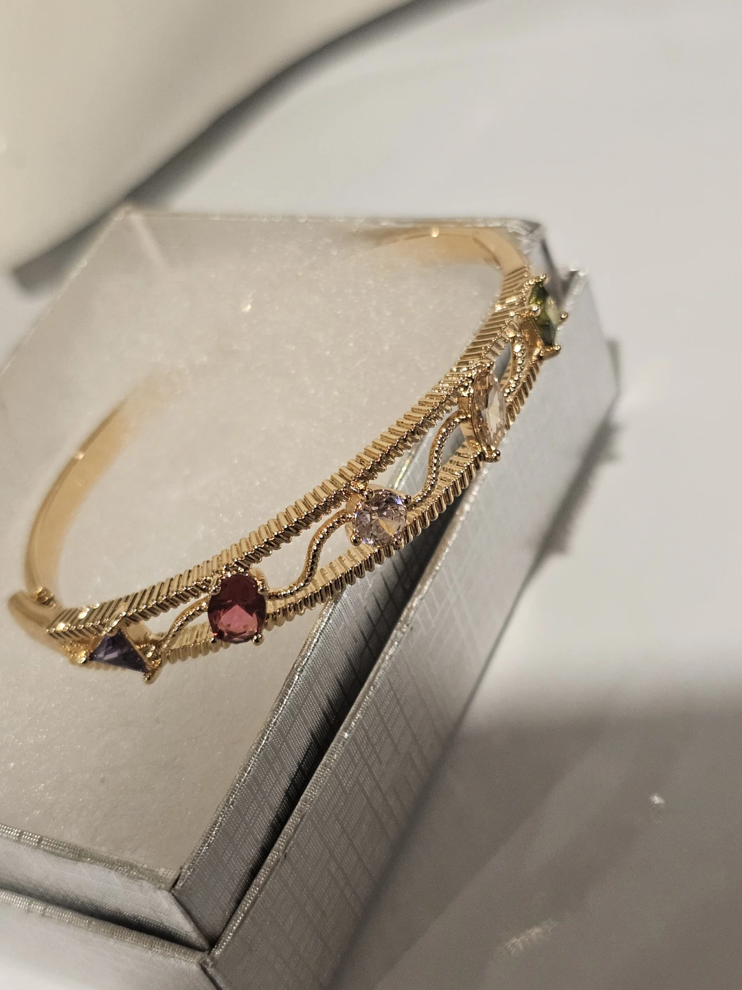 Gold tone bangle bracelet with colourful stones - photo 2